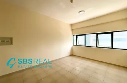 Apartment - Studio - 1 Bathroom for rent in Al Shaiba Building - Dubai Outsource Zone - Dubai