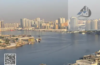 شقة - غرفة نوم - 2 حمامات للايجار في أورينت تاور 1 - أورينت تاور - البستان - عجمان