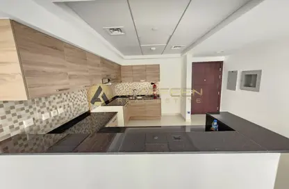 صورة لـ مطبخ شقة - غرفة نوم - 2 حمامات للايجار في البرج الأسباني - مدينة دبي الرياضية - دبي ، صورة رقم 1