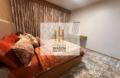 Apartment - 1 Bedroom - 2 Bathrooms for sale in Orient Towers - Al Bustan - Ajman