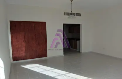 Empty Room image for: Apartment - 1 Bathroom for rent in Y19 - England Cluster - International City - Dubai, Image 1
