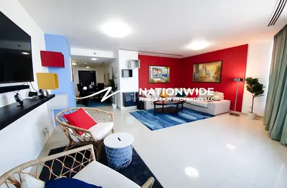 Living Room image for: Apartment - 1 Bedroom - 2 Bathrooms for sale in Sky Tower - Shams Abu Dhabi - Al Reem Island - Abu Dhabi, Image 1