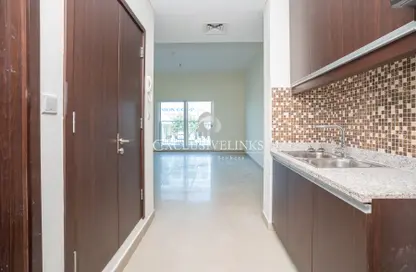 Kitchen image for: Apartment - 1 Bathroom for rent in Eden Apartments - Motor City - Dubai, Image 1