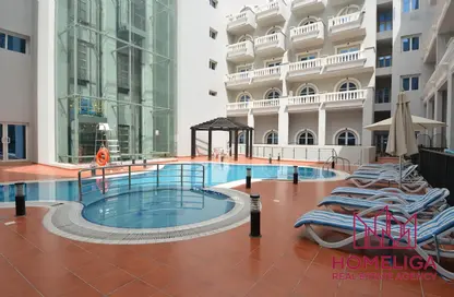 صورة لـ حوض سباحة شقة - غرفة نوم - 2 حمامات للبيع في شقق الخريف - سيزون كوميونيتي - قرية الجميرا سركل - دبي ، صورة رقم 1