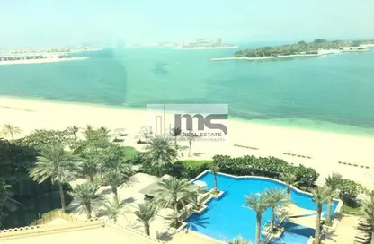 Pool image for: Apartment - 2 Bedrooms - 3 Bathrooms for rent in Jash Falqa - Shoreline Apartments - Palm Jumeirah - Dubai, Image 1