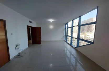 Empty Room image for: Apartment - 2 Bedrooms - 2 Bathrooms for rent in Pearl Tower - Electra Street - Abu Dhabi, Image 1