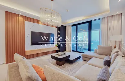 Living Room image for: Apartment - 3 Bedrooms - 4 Bathrooms for sale in Jumeirah Gate Tower 1 - The Address Jumeirah Resort and Spa - Jumeirah Beach Residence - Dubai, Image 1