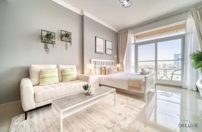 Living Room image for: Apartment - 1 Bathroom for rent in Siraj Tower - Arjan - Dubai, Image 1