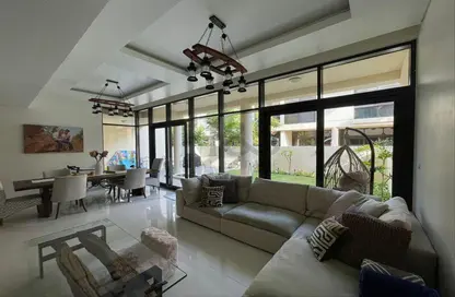 Living / Dining Room image for: Villa - 4 Bedrooms - 4 Bathrooms for rent in Rockwood - DAMAC Hills - Dubai, Image 1