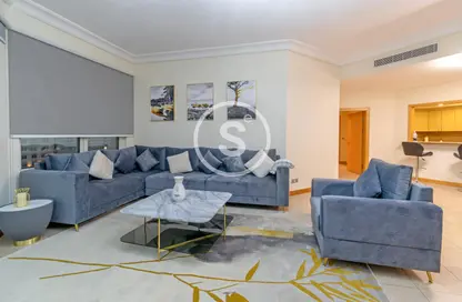 Living Room image for: Apartment - 3 Bedrooms - 4 Bathrooms for rent in Al Khushkar - Shoreline Apartments - Palm Jumeirah - Dubai, Image 1