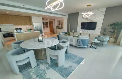 Living / Dining Room image for: Apartment - 3 Bedrooms - 4 Bathrooms for rent in Beach Vista - EMAAR Beachfront - Dubai Harbour - Dubai, Image 1
