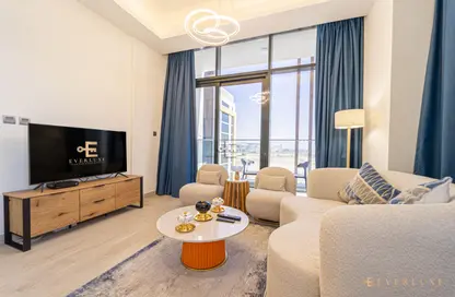 Living Room image for: Apartment - 1 Bedroom - 1 Bathroom for rent in AZIZI Riviera 13 - Meydan One - Meydan - Dubai, Image 1