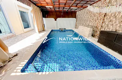 صورة لـ حوض سباحة فيلا - 5 غرف نوم - 6 حمامات للبيع في طراز صحراوي - فيلات الريف - مشروع الريف - أبوظبي ، صورة رقم 1