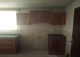 صورةمطبخ لـ: عمارة بالكامل - 4 حمامات للبيع في النعيمية - عجمان, صورة 1