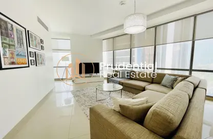 Living Room image for: Apartment - 2 Bedrooms - 3 Bathrooms for rent in Etihad Tower 4 - Etihad Towers - Corniche Road - Abu Dhabi, Image 1