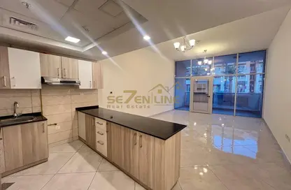 Apartment - 1 Bathroom for sale in Chaimaa Premiere - Jumeirah Village Circle - Dubai