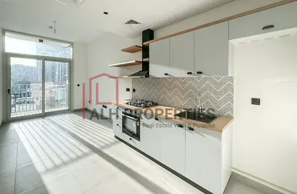 Kitchen image for: Apartment - 1 Bedroom - 1 Bathroom for rent in Socio Tower 2 - Socio Tower - Dubai Hills Estate - Dubai, Image 1