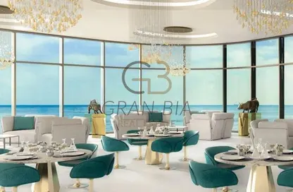 Living / Dining Room image for: Apartment - 1 Bathroom for sale in Oceanz by Danube - Maritime City - Dubai, Image 1