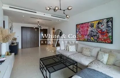 Living Room image for: Apartment - 1 Bedroom - 2 Bathrooms for sale in Hartland Greens - Sobha Hartland - Mohammed Bin Rashid City - Dubai, Image 1