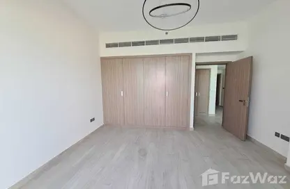 Room / Bedroom image for: Apartment - 1 Bedroom - 2 Bathrooms for sale in Farhad Azizi Residence - Al Jaddaf - Dubai, Image 1
