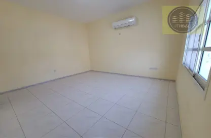 Empty Room image for: Apartment - 1 Bathroom for rent in Complex 8 - Khalifa City - Abu Dhabi, Image 1