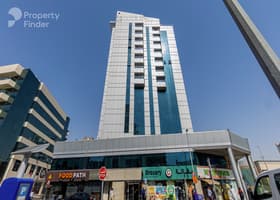 صورة لـ التصميم الخارجي للمبنى في بناية الوحدة